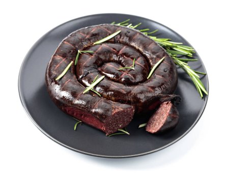 Photo for Black pudding or blood sausage with rosemary on a black plate. Isolated on a white background. - Royalty Free Image
