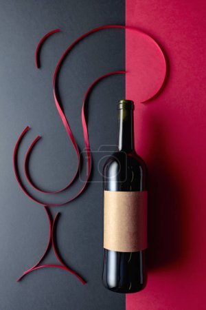 Photo for Bottle of red wine with old empty label. Top view. - Royalty Free Image