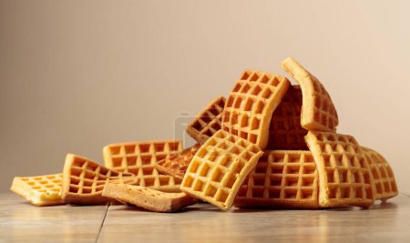 Photo for Belgian waffles on a beige ceramic table. Copy space. - Royalty Free Image