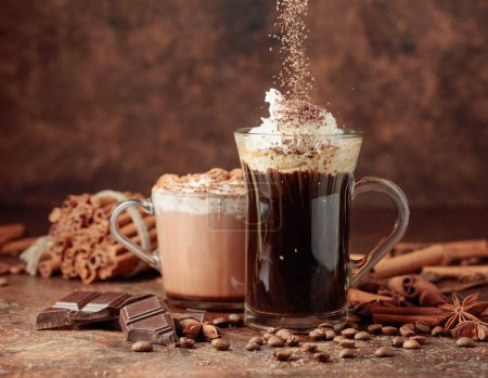 Photo for Coffee and hot chocolate with whipped cream sprinkled with chocolate crumbs. - Royalty Free Image
