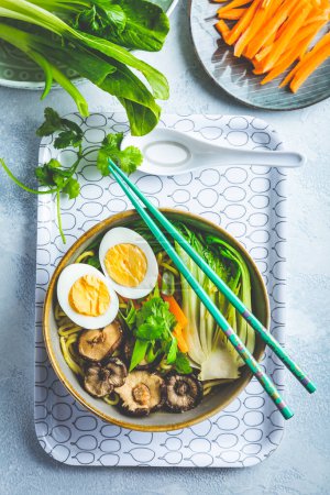 Photo for Ramen soup  with shiitake mushrooms, vegetables, noodles and  egg - Royalty Free Image