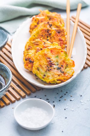 Photo for Korean vegetable pancakes with dipping sauce, Korean pizza - Asian food style - Royalty Free Image