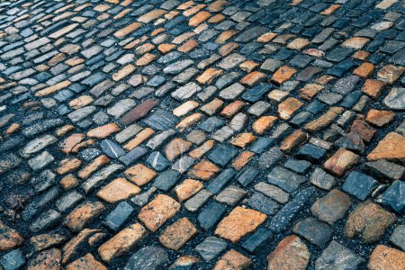 Photo for The pavement of granite stone. Paved roadway street, texture, background, selective focus. - Royalty Free Image