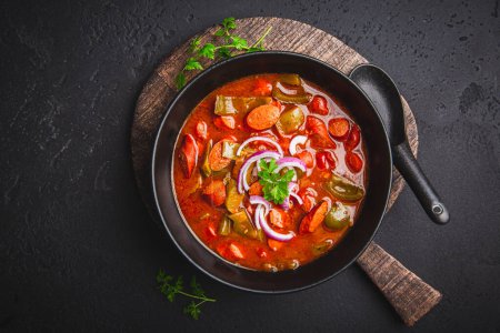 Photo for Traditional Solyanka soup - thick and sour soup of Russian origin - Royalty Free Image