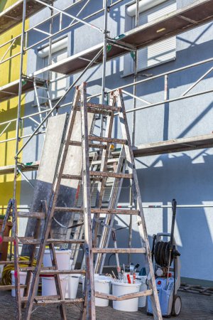 Photo for Modern house under construction with scaffold pole platform. New build domestic building - Royalty Free Image