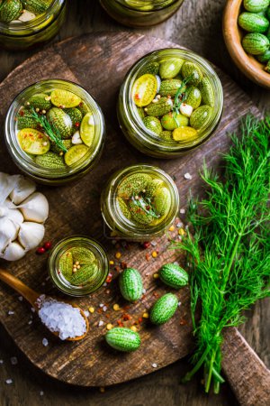 Photo for Homemade food: Pickled cucamelons (pickled cucumbers, pickled gherkins), grown in a organic kitchen - Royalty Free Image