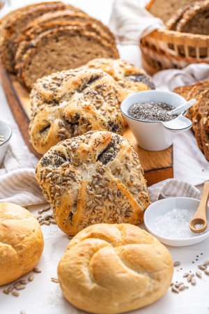 Photo for Assortment of different kind of cereal bakery - bread, pasties, buns, with healthy seeds - Royalty Free Image
