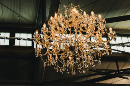 Photo for Chrystal chandelier in a industry hall - Royalty Free Image