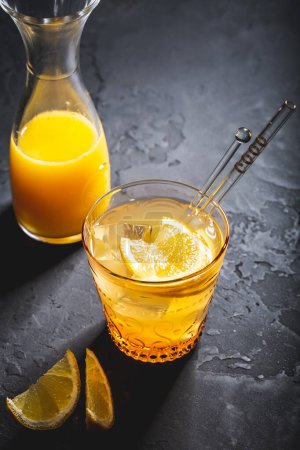 Photo for Ginger and lemon refreshing lemonade or cocktail, immunotherapy drink - Royalty Free Image