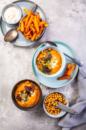 Photo for Homemade sweetpotato and carrot soup with chickpeas - Royalty Free Image