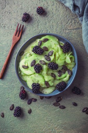 Photo for Cucumber salad with blackberries and yogurt dressing and seeds - Royalty Free Image