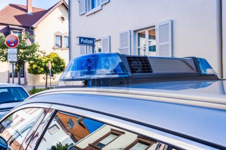 Photo for German police car on the street, detail of blue siren flasher. Parking at police station. Translation: Police - Royalty Free Image