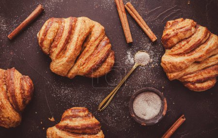 Photo for Cinnamon rolls or Franzbroetchen -  Germany sweet pastry sweet pastry baked with butter and cinnamon,  croissant - Royalty Free Image