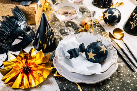 Photo for Christmas And New Year Holiday Table Setting with Champagne. - Royalty Free Image
