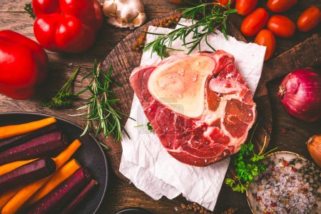 Photo for Raw beef meat shank steak, with  ingredients for preparation of ossobuco - Royalty Free Image