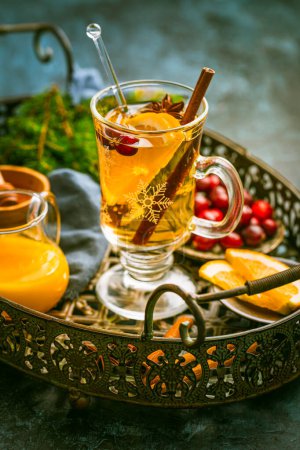 Photo for Delicious white mulled wine with orange, honey, cranberries and spices - Royalty Free Image