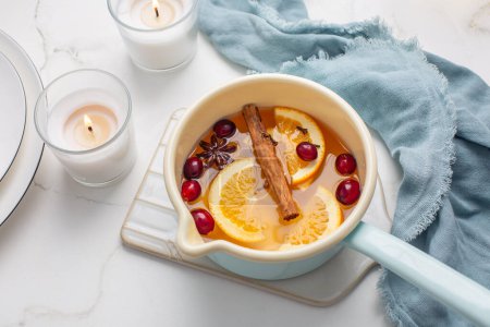 Photo for Delicious white mulled wine with honey, cranberries and spices - Royalty Free Image