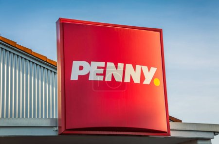 Photo for Hockenheim, Germany, December 18, 2023:  Penny sign.  Penny is a German discount supermarket chain owned by Rewe Group with many locations in Europe - Royalty Free Image