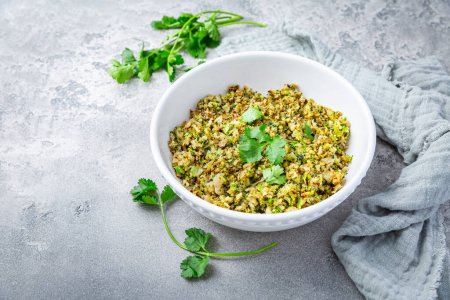 Photo for Roasted organic cauliflower and broccoli rice with herbs - paleo and ketogenic diet concept - Royalty Free Image