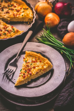 Photo for Homemade onion cake with bacon, traditional German savory onion pie (Zwiebelkuchen) - Royalty Free Image