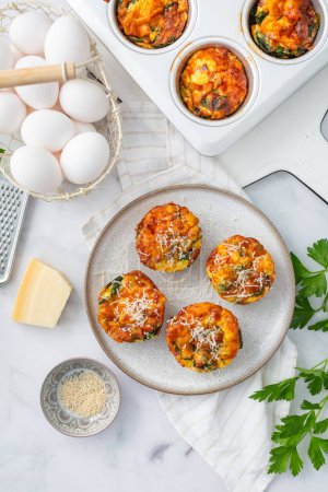 Photo for Homemade healthy spinach and cheese egg muffins, high protein and low carb breakfast - Royalty Free Image