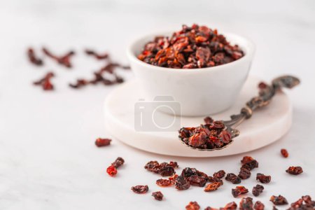 Photo for Pile of dried Berberis vulgaris, common barberry, European barberry or barberry. Edible herbal medicinal red fruit plant. - Royalty Free Image