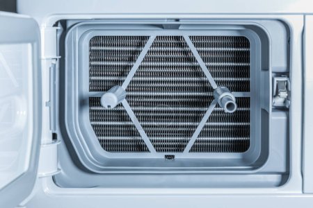 Foto de Detalle de Secador de bomba de calor con intercambiador de calor y filtro de zócalo - Imagen libre de derechos