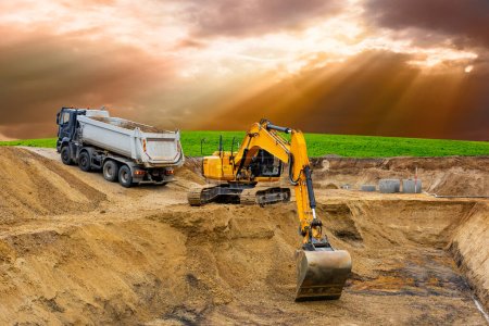 Photo for Excavator is digging and working at construction site - Royalty Free Image