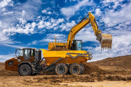Photo for Excavator is working and digging at construction site - Royalty Free Image