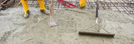 Photo for Worker is concreting the foundation of a house - Royalty Free Image