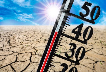 thermometer shows high temperature in summer heat with dryness and lack of water in field