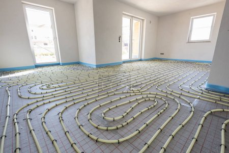 Photo for Underfloor heating system in construction of new built residential home - Royalty Free Image