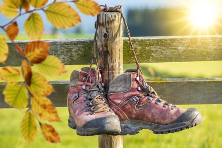 Photo for Hiking boots on tour at autumn - Royalty Free Image
