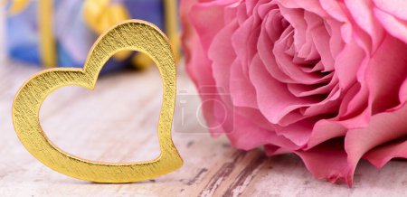 Photo for Heart and rose flower as symbol for love - Royalty Free Image
