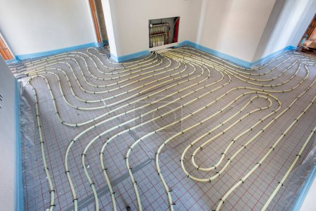 Photo for Underfloor heating system in construction of new built residential home - Royalty Free Image