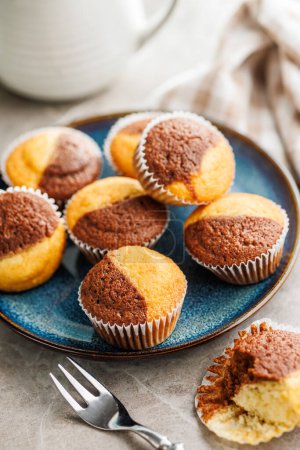 Close Up of a Muffins on plate on a kitchen table