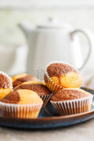Close Up of a Muffins on plate on a kitchen table