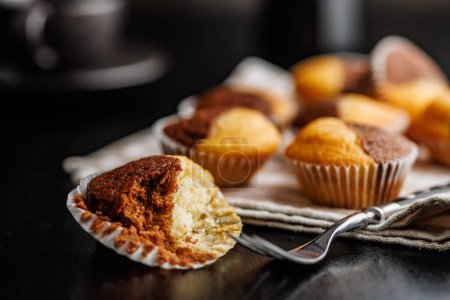 Close Up of a Muffins on a black table.