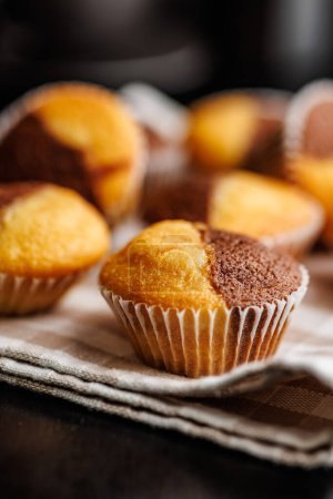 Close Up of a Muffins on a black table.