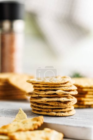 A Pile of Crackers on a white Table