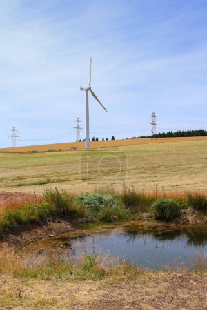 Téléchargez les photos : High voltage power lines and wind power plant - en image libre de droit