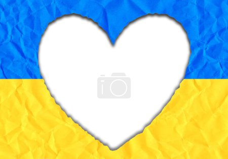 Scrap of paper in the shape of a heart in the colors of the Ukrainian flag, copy space