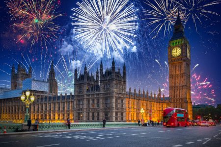 Photo for New years fireworks display over the Big Ben and Westminster Bridge in London, UK - Royalty Free Image