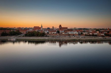 Photo for Wisla river by the Torun city at sunset, Poland. - Royalty Free Image