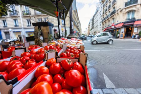 Tomatoes on display at a street market in Paris, France