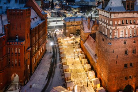 Photo for Beautifully lit Christmas market in the Main City of Gdansk at dawn. Poland - Royalty Free Image