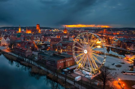 Photo for Old town in Gdansk by the Motlawa river at dusk, Poland. - Royalty Free Image