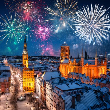 Photo for New Year fireworks display over the main town of Gdansk. Poland - Royalty Free Image