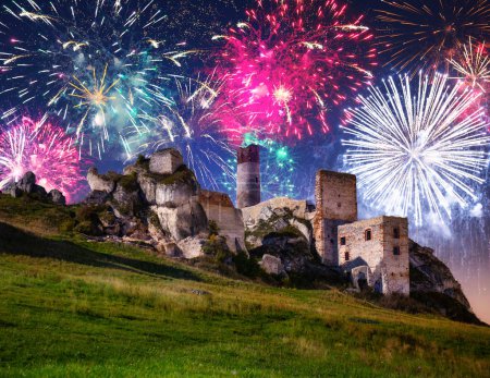 Photo for The ruins of the castle in Olsztyn near Czestochowa with fireworks. Poland - Royalty Free Image