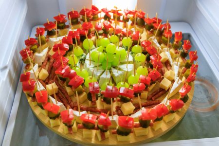 Photo for Selection of the party snacks on a board. - Royalty Free Image